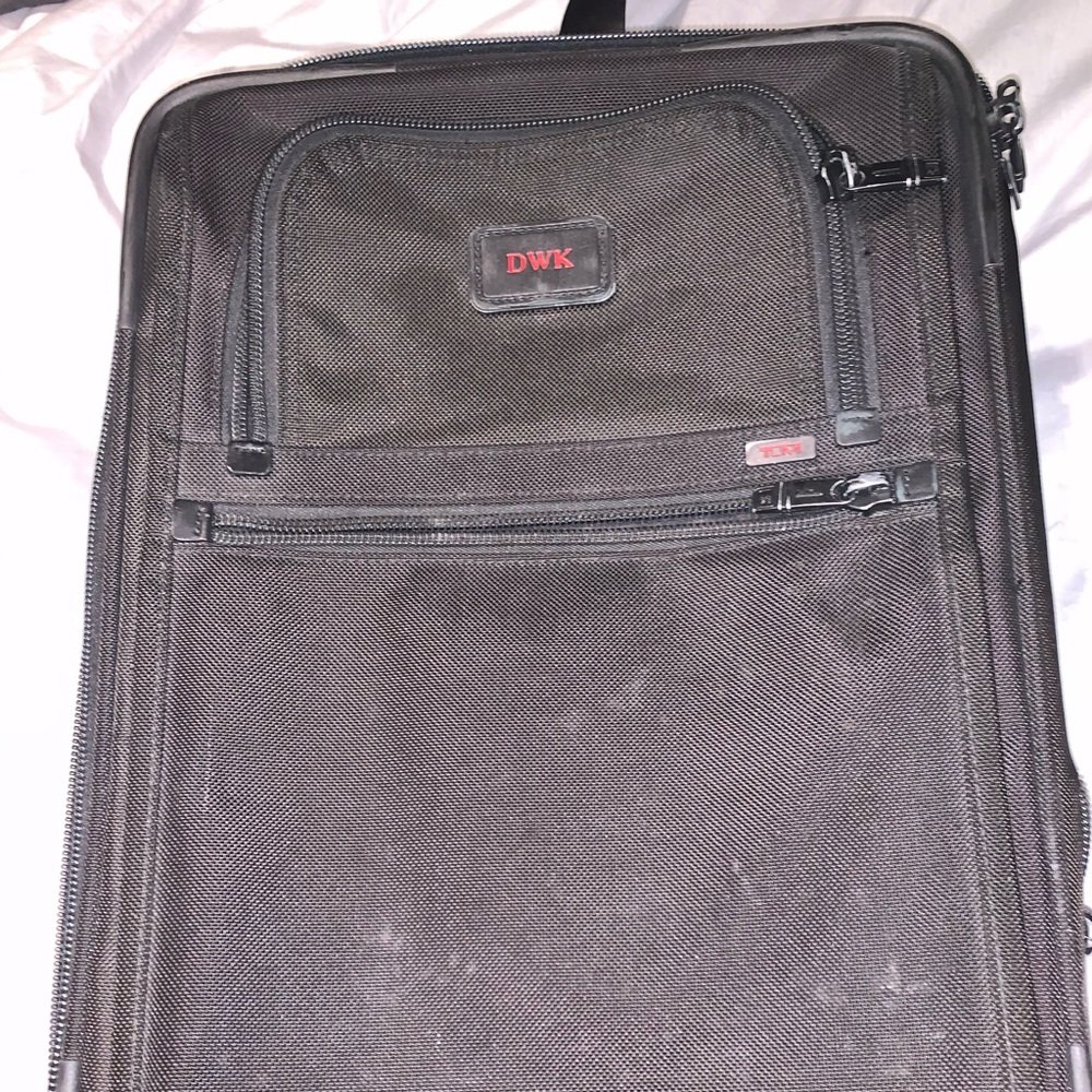 Tumi 20” roller bag in good condition.